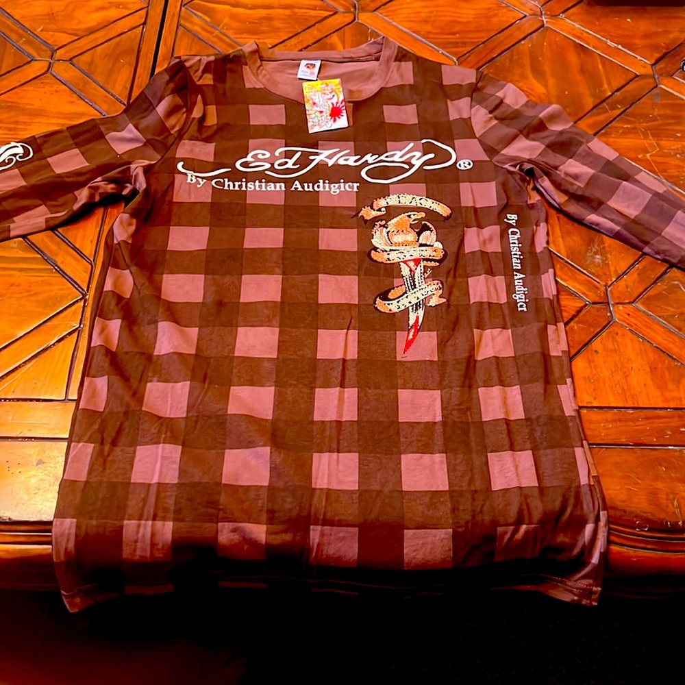 Beautiful with tags Ed Hardy long sleeve from clean non smoking no pet home.